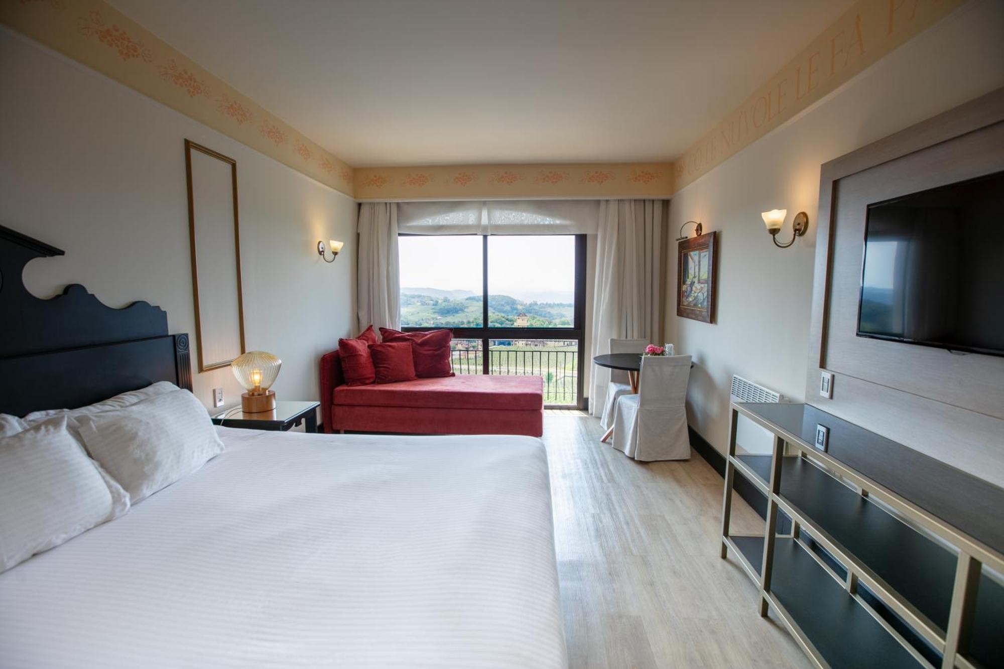 Spa Do Vinho Condominio Vitivinicola Bento Gonçalves Esterno foto A room at the hotel