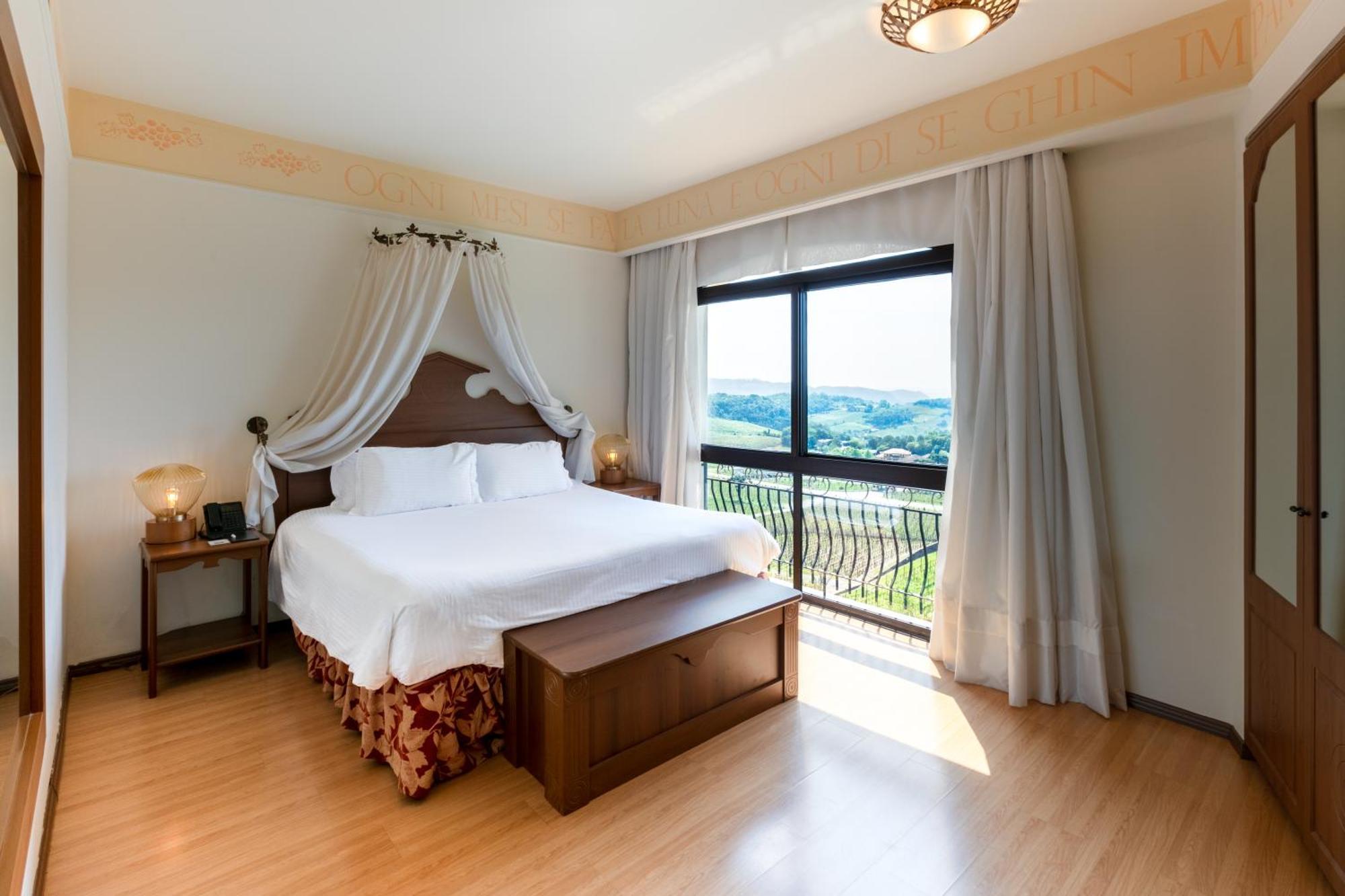 Spa Do Vinho Condominio Vitivinicola Bento Gonçalves Esterno foto A bedroom at the hotel