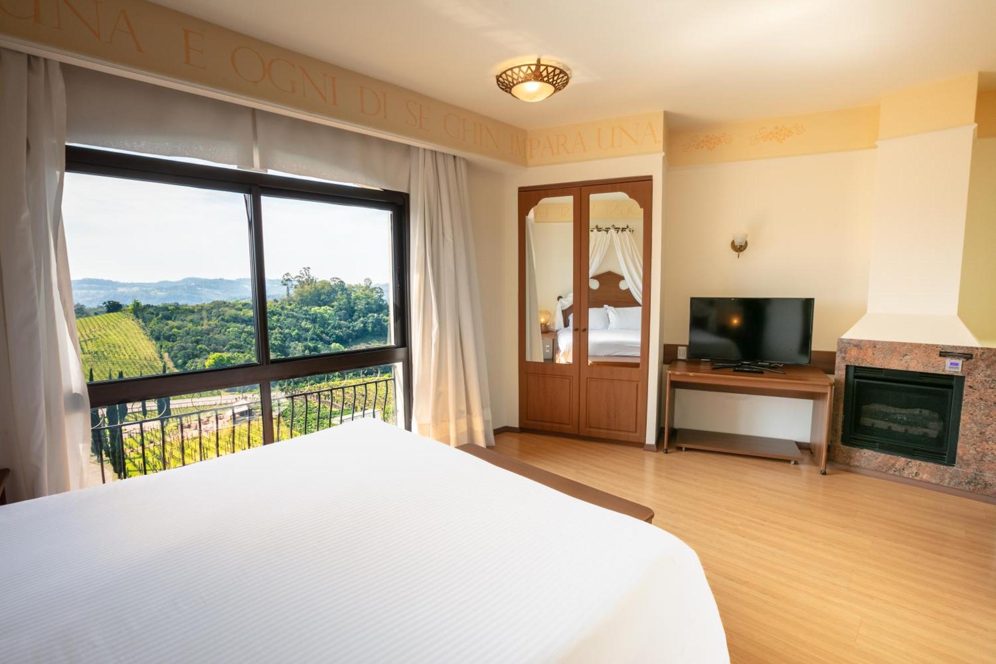 Spa Do Vinho Condominio Vitivinicola Bento Gonçalves Esterno foto A bedroom at the hotel
