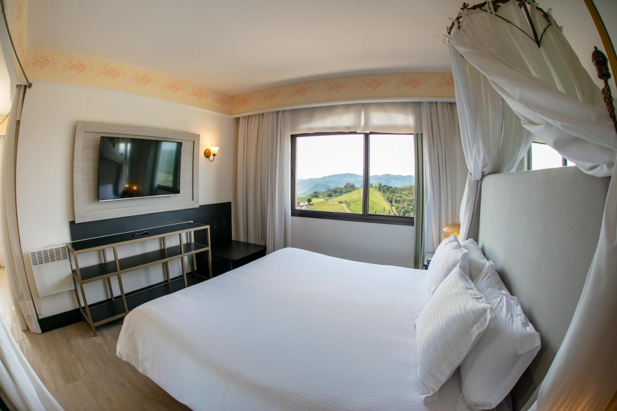 Spa Do Vinho Condominio Vitivinicola Bento Gonçalves Esterno foto A bedroom at the hotel