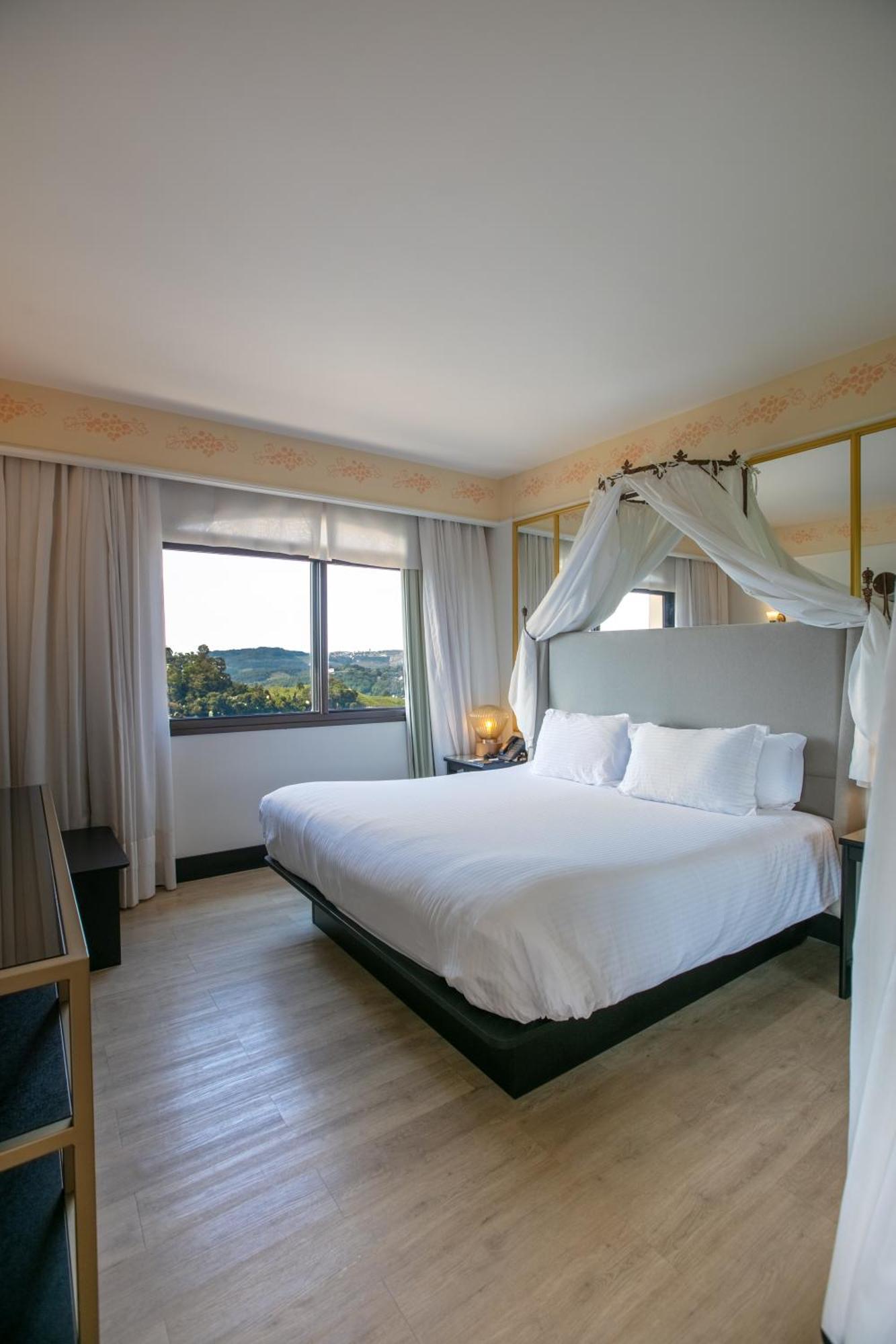 Spa Do Vinho Condominio Vitivinicola Bento Gonçalves Esterno foto A room at the hotel